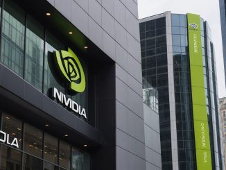 Nvidia logo with stock market graphs